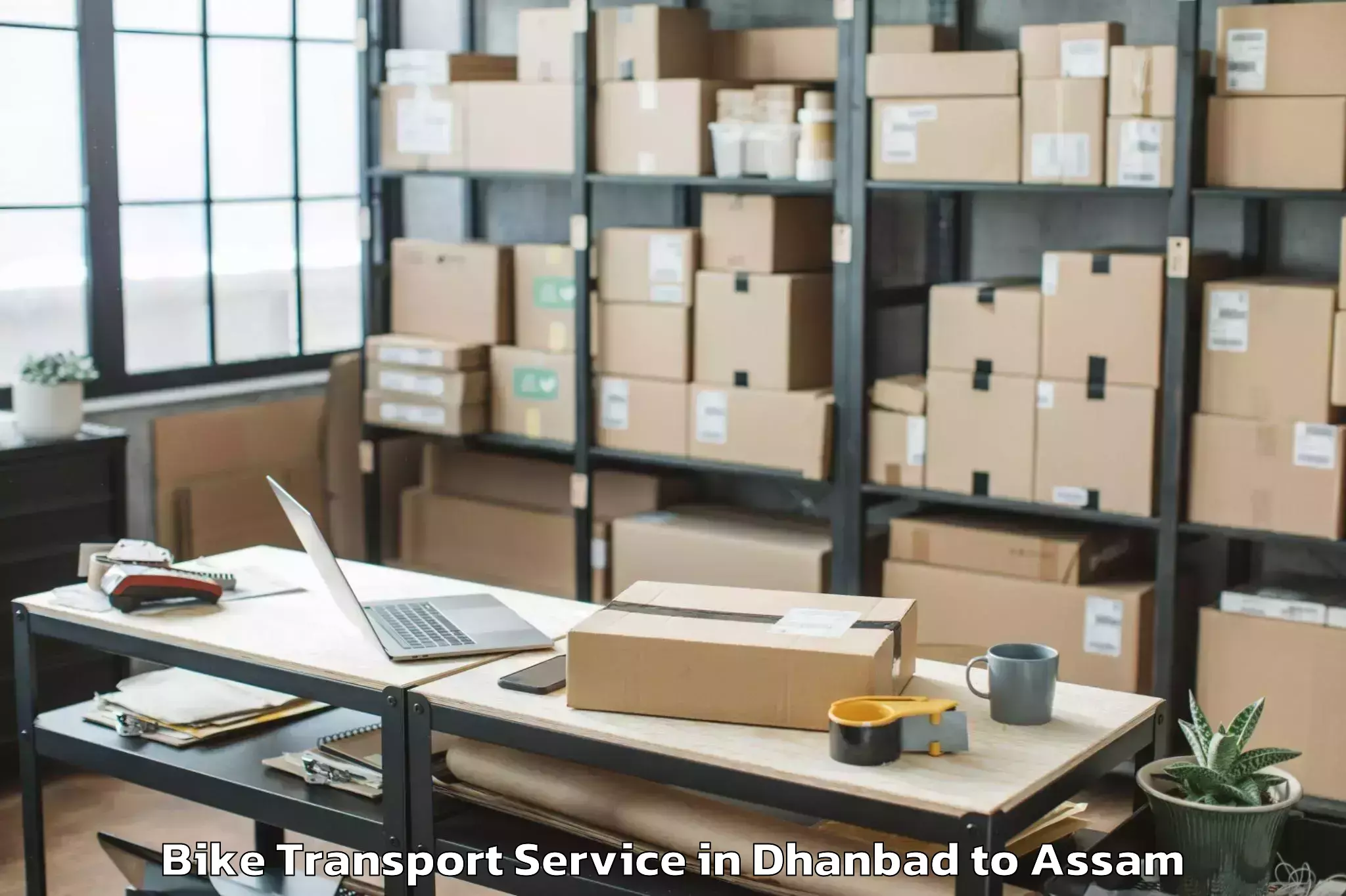 Easy Dhanbad to Tezpur University Bike Transport Booking